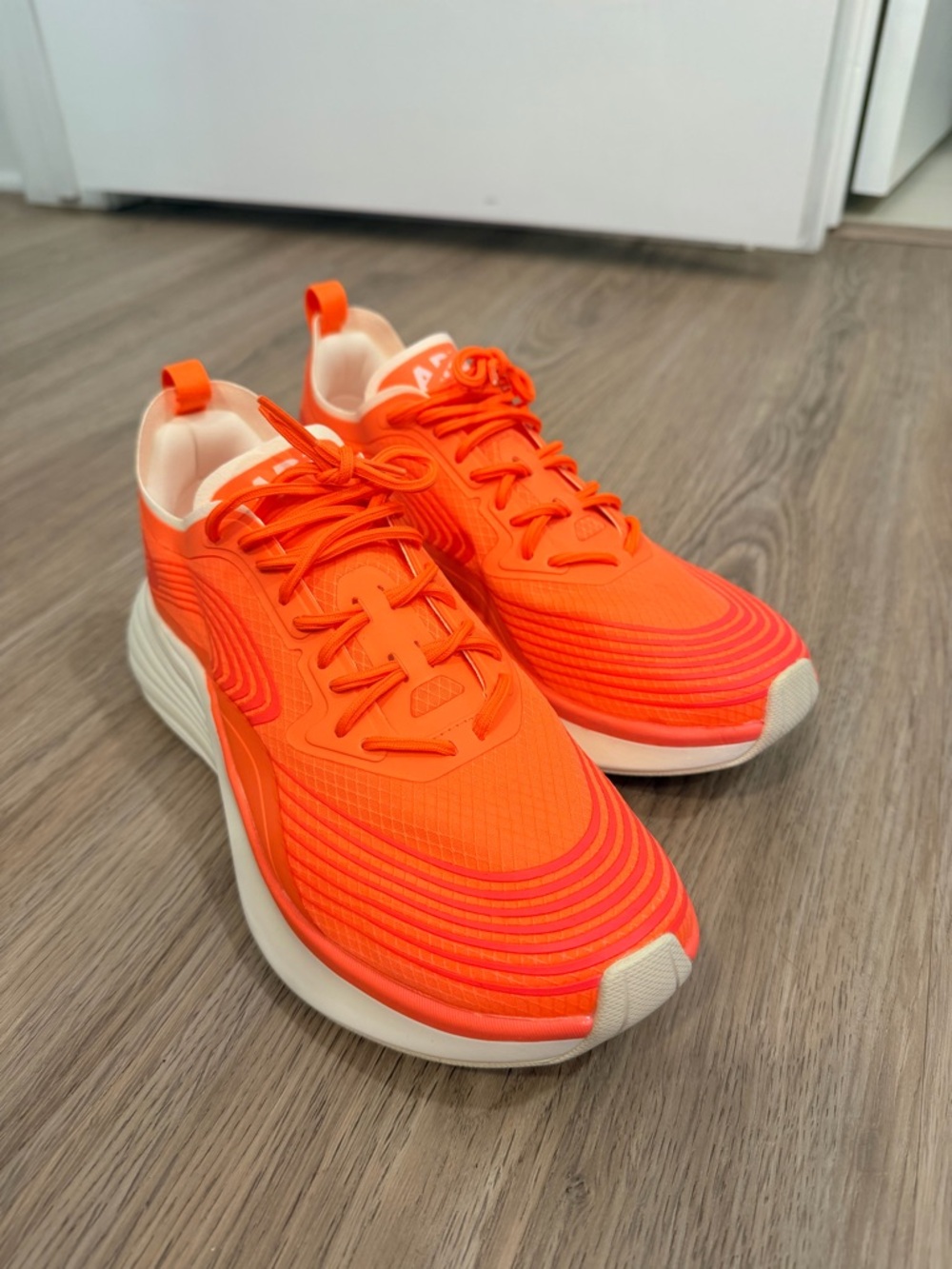 APL Neon Orange Running Sneakers